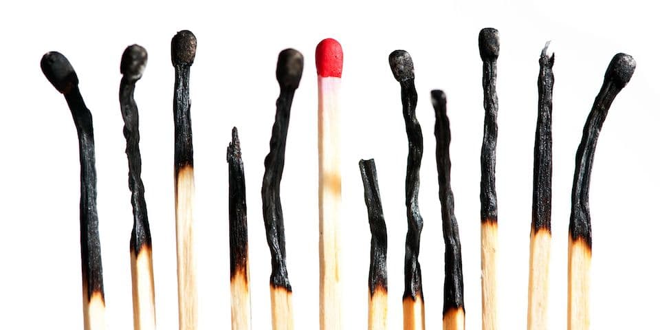 row-of-burnt-match-sticks-with-one-not