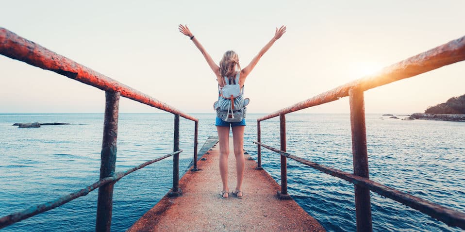 woman-on-pier-at-sunset