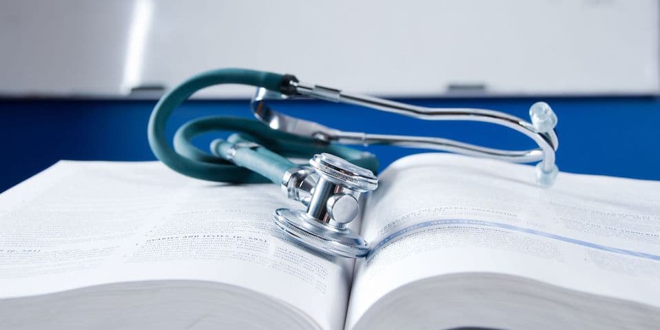 stethoscope-on-nursing-text-book