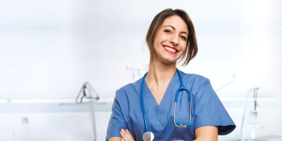 smiling-nurse-in-blue-scrubs
