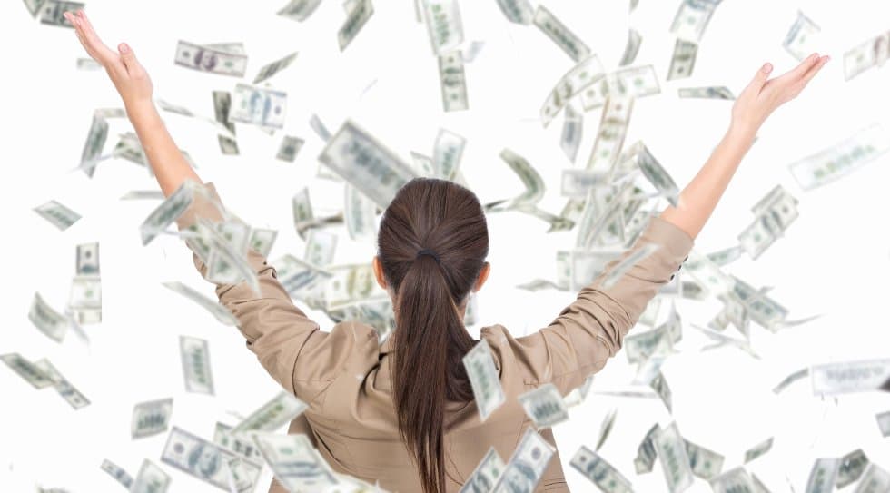 woman-with-money-flying-around-her