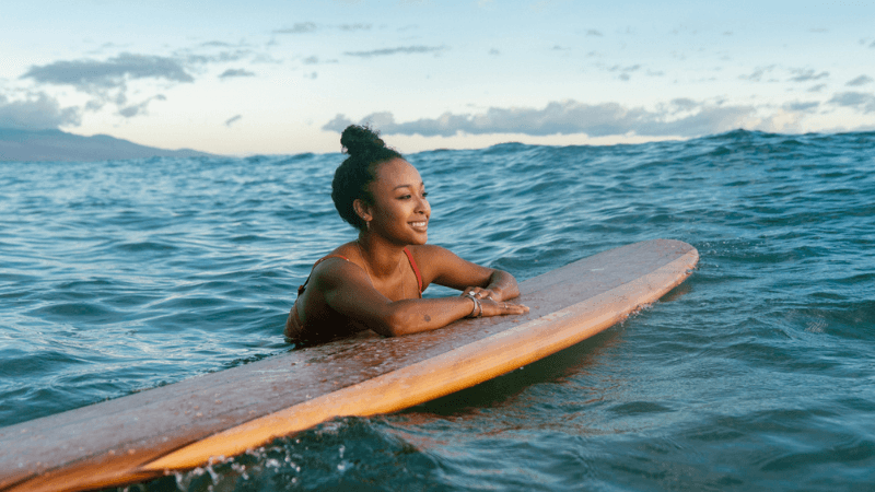 travel nurse learning to surf in hawaii